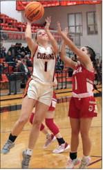 Kinsley Williams goes op fir a transition layup. photo by J. D. Meisner