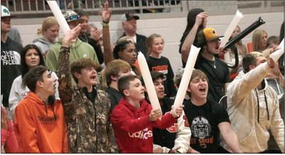 Cushing fans celebrate a Tiger three pointer. photo by J. D. Meisner