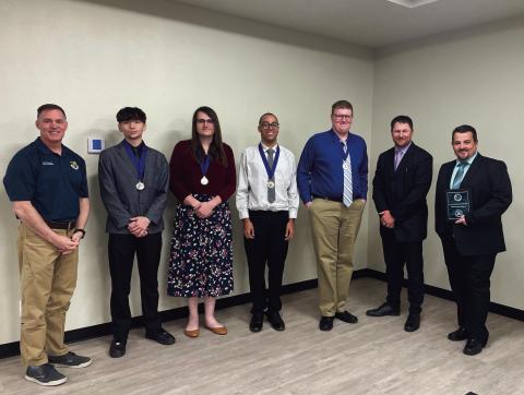 Adult team, 2nd place from L to R: Colonel G. Hall Sebren, Jr.; Cedric Mackey, Hominy; Morgan Kaiser, Drumright; DeVonte Jones, Cushing; Adain Wikel, Ripley; Dustin Ford; Nick Gaunt