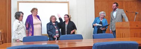 Judy Grotts with Cushing Commission Chairman B.J. Roberson, as she accepts the proclamation decree and introduces the garden club committee.