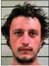 MICHAEL LLOYD HENSON JR - 25 City of Cushing Warrant, No/Expired Drivers License, Transporting an open container, Passenger transports open container.