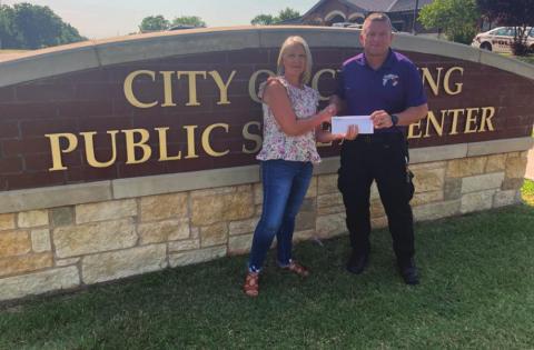 Pictured are Gail Cookerly, Central Community Foundation board member and Franklin Reed, Cushing Emergency Management Director.