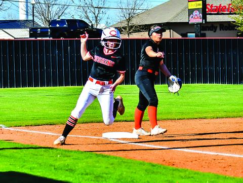 Maya Bridgeman holds at third base after any Tiger Romy Withiam singles. Photo by Sarah Townes