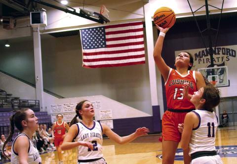 Ella Nanaeto attacks the paint against Mannford. Photos by J. D. Meisner