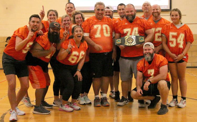 The winners of the inaugural Cushing Rotary Dodgeball Tournament, team Snoop Dodgey Dodge, stand proud with their championship belt Tuesday, Sept. 27. Pictured from left: Back row; JJ Wood, Lindsay Morgan, Melisa Amon, Jake Phillips, Jake Christensen, Bobby Hoover. Front row: Jared Bush, Josh Encinas, Don Amon, Rusty Morgan, Dave Brown, Faith Kessler, Jay Moore. 5
