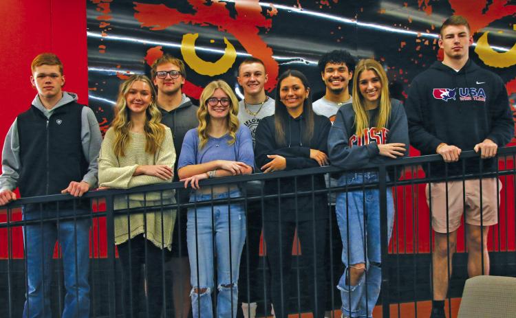 Cushing 2024 Wrestling Homecoming Court pictured from left, top row, King Candidates Kade Ralston, Andy Collier, and Carlos Moncada-Lopez. Bottom row, kid escort Levi Simpson, Queen candidates Aspen Evans, Trista Looper, Ava Babinec, and kid escort Tyler Hockett. Not pictured is King candidate Dalton Allen. Homecoming and senior night will both take place on Thursday, Feb. 1 at the high school gym. Photo by Allie Prater.