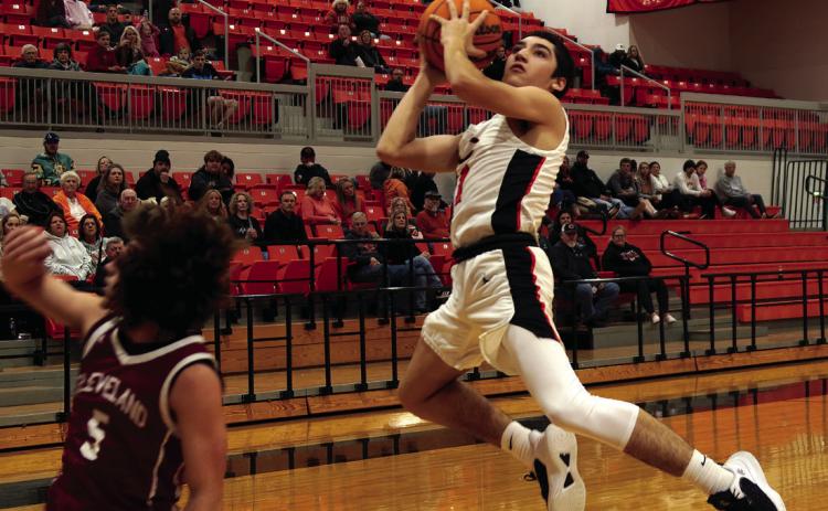 Kanaan Guerrero makes a transition layup. Photo by J.D. Meisner.
