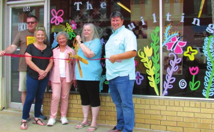 From left: Downtown Cushing Revitalization Association President Justin Cargill, Cushing Chamber of Commerce President/CEO Tracy Caulfi eld, DCRA member Marilyn Duff, Owner Debra Shiplett and Cushing Economic Development Director Bruce Johnson came out on July 20 for a ribbon cutting ceremony at The Quilting Hut located at 106 North Harrison.