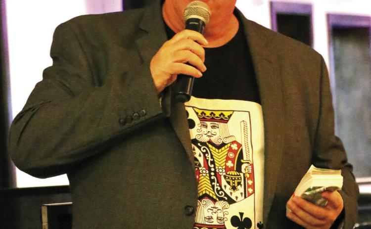 Cushing Rotary President Dr. Don Amon gives a welcoming speech during the second annual Cushing Rotary Club Casino Night Fundraiser held at Buffalo Rock Golf Course. Photo by Allie Prater.