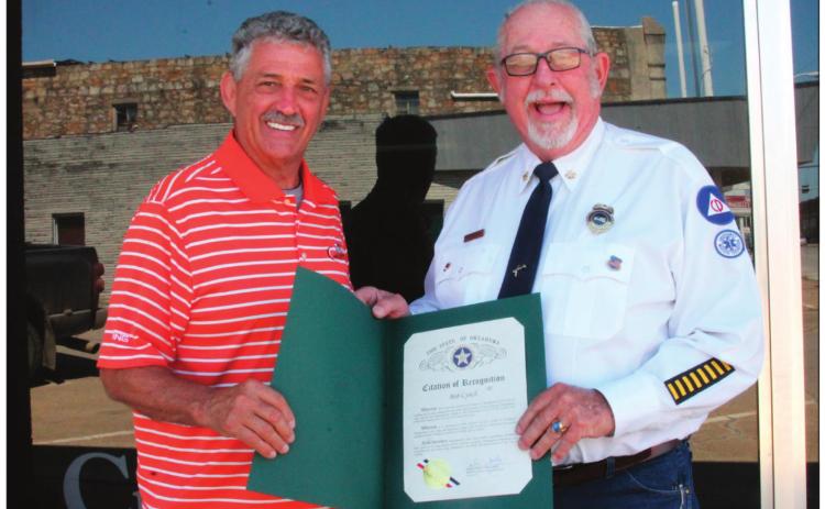 Oklahoma Representative John Talley presents Bob Lynch with a Citation of Recognition for 50 Years of Service.