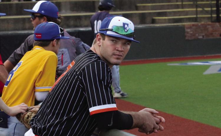 Riley Matheson looks onto the field as he awaits the commencement of the 2023 Oklahoma Baseball Coaches Association All-State game. Matheson finished the game going 1-1 with a single and an RBI and entered the game at catcher in the fifth inning.