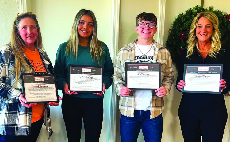Cushing Chamber of Commerce President and CEO Tracy Caulfield celebrated the chamber’s “Business After School, November honorees Monday with a reception in their honor. Selected for the Month of November were, from left, Teacher of the Month Brandi Brichacek, Cushing Middle School science teacher; Student of the Month Gabriella Craig, Student of there Month Carl Peterson; and Support Employee of the month Rachael Simpson, Cushing Upper Elementary teaching assistant. Photo by J. D. Meisner