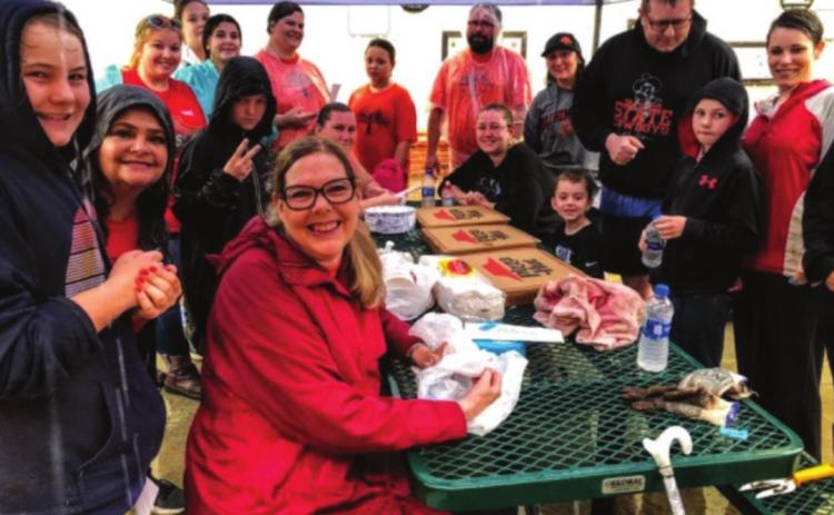 Volunteers were fed pizza prior to braving the elements for.
