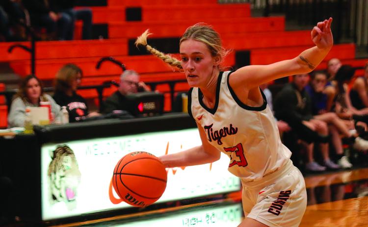 Kaitlyn Callanan heads toward the baseline. Photos by J. D. Meisner