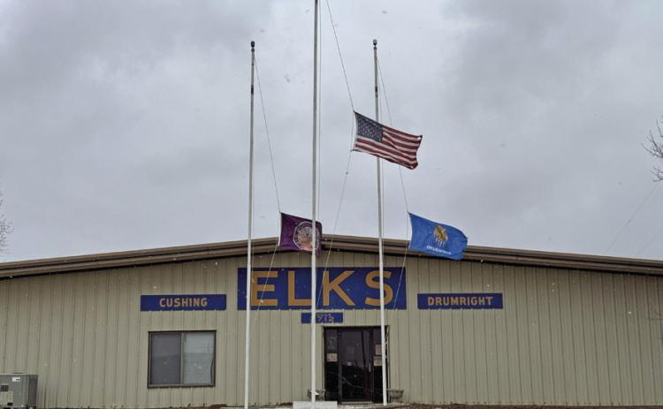 Flags at the Cushing-Drumright Elks Lodge fly at half mast during the snow storm Sunday, Jan. 5. Photo by Allie Prater