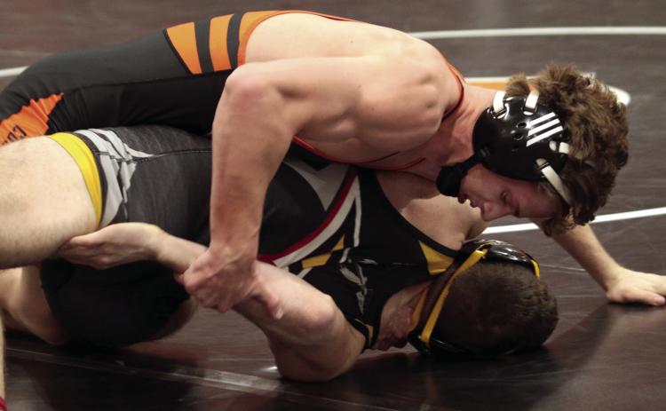 CHS Wrestler Kaiser Simpson had a good night, defeating his opponent by technical fall and being named homecoming king, 2023. Photo by J.D. Meisner.