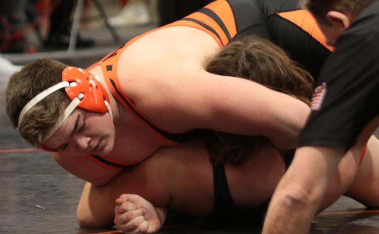 Tiger Aaron Vieyra pins Landon Schroeder of Kingfisher. photo by J. D. Meisner