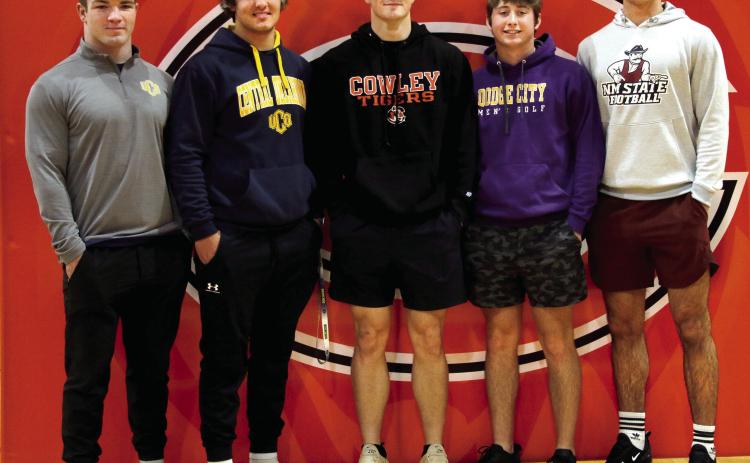 Five Cushing Tiger seniors signed to play sports at the next level last week. Riley Matheson and Brody Berlowitz will play baseball for UCO; Jacob Horn signed to play baseball for Cowley County College; Kolby Legg will play golf at Dodge City Community College and Blaze Berlowitz signed to play D1 football at New Mexico State University. Photo by Allie Prater.