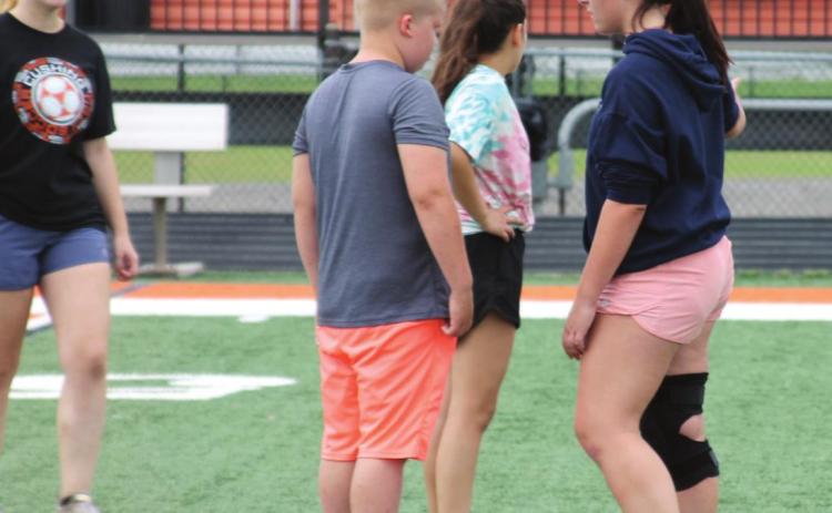 Ashlynn Arnce coaches her team through scrimmages during the 2022 Cushing Tiger Soccer Camp. Photo by Kaleb Tadpole.