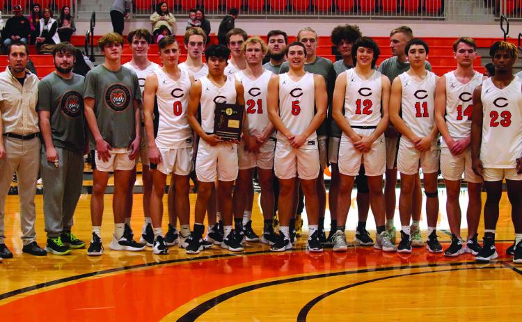 The Cushing Tigers keelhauled the Bristow Pirates 74-50 Friday to claim the district championship and advance to the regional brackets. They play Oklahoma Christian School Thursday, 7:30 p.m., at Oklahoma Christian. Photo by J.D. Meisner