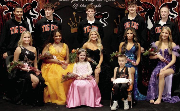 Cushing High School 2023 Wrestling Homecoming Court pictured from left back row: Xavier Wilson, Kobe Smith, Kaiser Simpson, Rylan McClure, Kyle Sams. Front row: Jordan Vaughn, Peyton Wood, Kinzie Smith, Karmine Mendez, Jade Morgan. Flower girl Jensyn Myers, and crown bearer Owen Spurgeon.