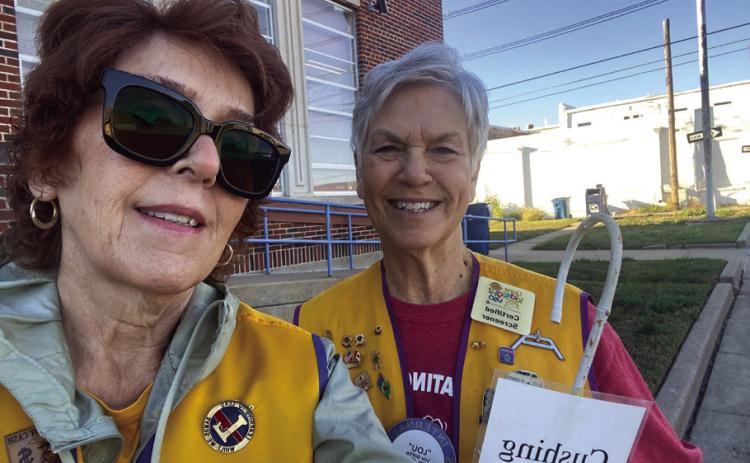 Cushing Lions Club members Mary Kelly and Lou Griffith were outside the Cushing post office on Oct. 8 with pamphlets, canes, and a donation bucket to highlight the work the group does for those with impaired or atrisk eyesight in recognition of White Cane Awareness Month. White Cane Awareness Month is dedicated to recognizing the white cane as a symbol of independence, empowerment, and safe travel for those who are blind or visually impaired — White Cane Awareness Day is nationally recognized on Oct. 15.