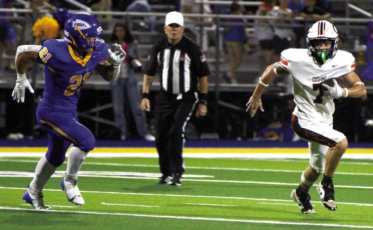 Lane Simpson blows past Berryhill containment. Photos by Sylvia Danyele