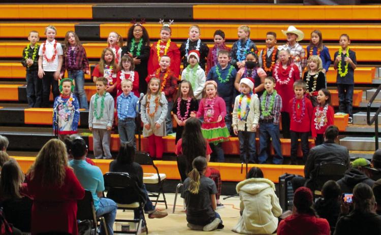 The third grade students at Agra Public School were ready for Christmas and vacation as they sang about all the places you can make your holidays merry and bright during the school’s annual Christmas program last Friday, Dec. 16. Photo by DeAnna Maddox.