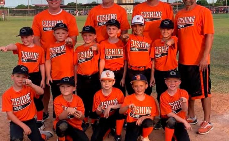 The 7U Tigers show off their championship rings from the Blanchard Tournament this weekend. They are, bottom row from left, Tate Hancock, Tyler Harrison, Eli Dennis, Lyndon Casarez and Wes Nickell. Second row from left Lucas Vieyra, Jackson House, Jacob House, Bo Hightower, Dillon Mann and Ford Turner. Back row from left, coaches Dusty Hancock, Brian Hightower, Matt Turner and Rennie Nickell.
