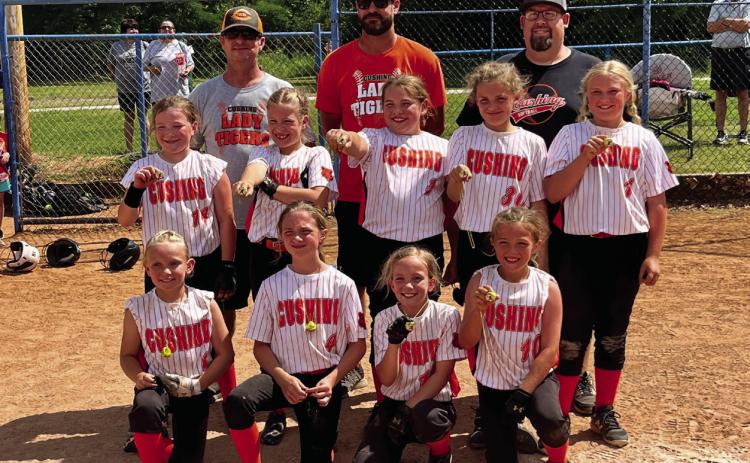 The Cushing Lady Tigers 9U team won the 2023 Lincoln County 10U tournament. The Lady Tigers from left. Coaches: JJ Scott, Jake Westmoreland, Aaron Hubbard. Back row: Brylee Thompson, Hadlea Westmoreland, Abigail Murie, Brenna Hubbard, Brooklyn Burns. Front row: Adley Scott, Natalie Wood, Ainsley Scott, Halle York.