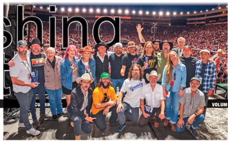 Dr. Hugh Foley, far top right, joined members of the Oklahoma Red Dirt acts Cross Canadian Ragweed, The Great Divide, Jason Boland &amp; The Stragglers and Stoney LaRue as they pose for a group photo after he announced their induction into the Oklahoma Music Hall of Fame during “The Boys from Oklahoma” concert last April, at Boone Pickens Stadium.