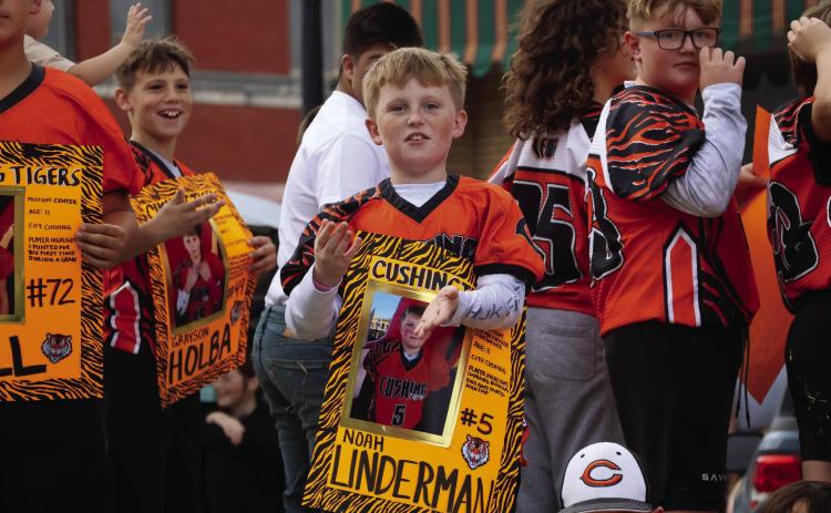 CUE football player Noah Linderman shows off his Tiger Spirit during the Homecoming Parade.