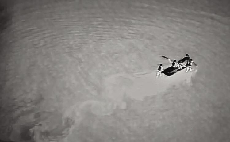 Drone view of water rescue team deploying from the East bank of the Cimarron River to pick up Cullum after impact. Photo courtesy of Olive Volunteer Fire Department.