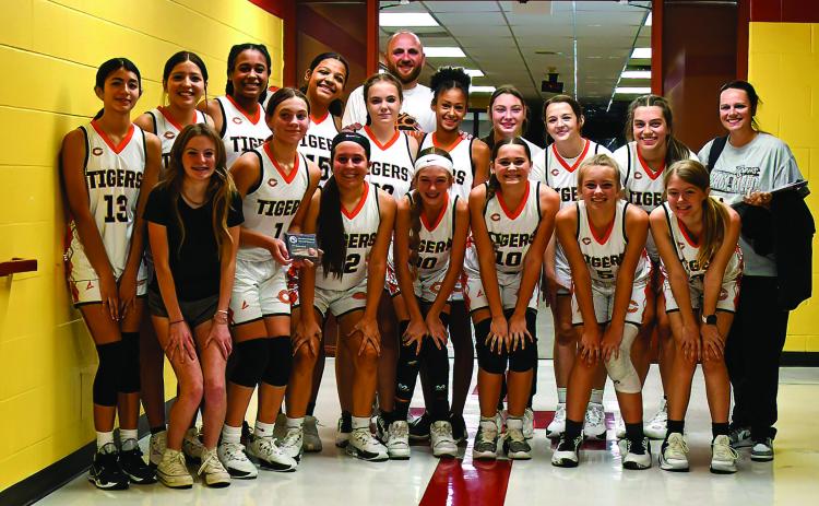 On Saturday, Nov. 11, the 8th Grade Lady Tiger Basketball team took third place in the Cleveland Basketball Tournament. They lost by 1 to Regent Prep in the semi finals, and beat Cleveland by 2 points to take third place. Photo by Sarah Townes