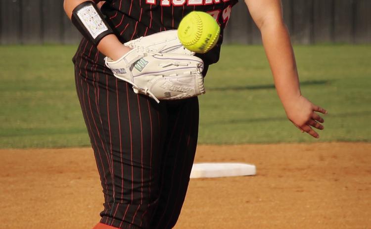 Vaeda Neugent pitches during the Bishop Kelley game Thursday, Sept. 24. Photo by Allie Prater.