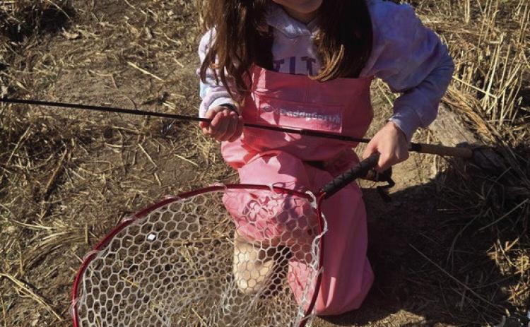 Grey Sanger with a trout caught at the Blue River. Share your photos with us on Facebook.