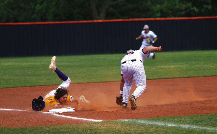 Rowdy Jackson does what he can with a Bristow base runner and a late throw at third base. Photo by Allie Prater