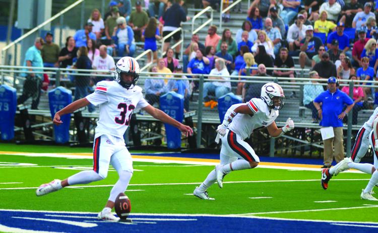 Landon Miller kicks off Cushing’s 2025 football season. The Tigers traveled to Berryhill Friday and eked out a 24-23 win. Story inside. Photo by Sylvia Danyele