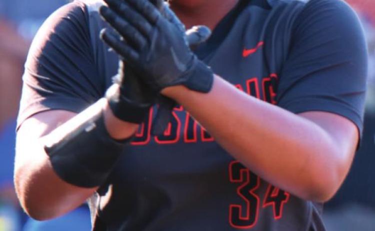 Nakiyah Jackson celebrates a run against Newcastle.
