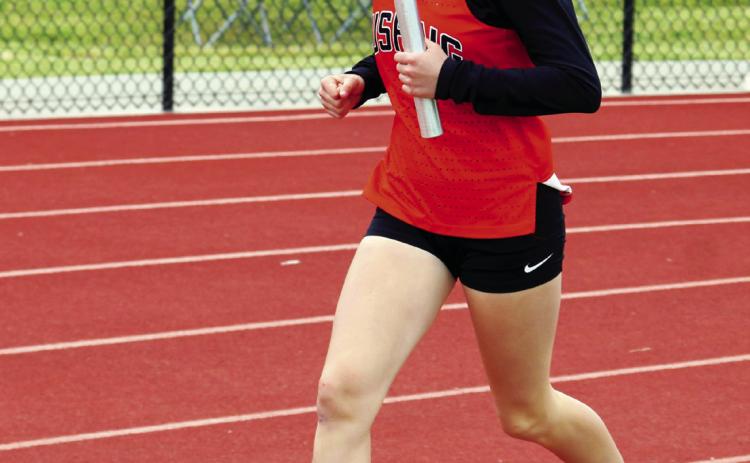 Romy Withiam sprints toward the finish. Withiam competed in the 4x200, 4x400 and 4x800 meter relays.