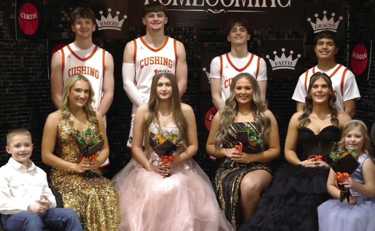 The 2026 CHS basketball homecoming court sits together after the coronation ceremony Friday, Jan. 30. Pictured back row from left, Boston Estes, King Roman Tucker, Curtis Parmley, Jason Edwards. Front row from left, crown bearer Duke Lauderdale, Emery Turner, Tirzah Wade, Faith Kessler, Gracyn Presley and flower girl Reese Lauderdale. Photos by Sylvia Danyele.
