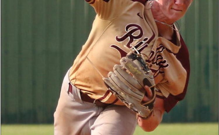 Ripley Warrior Caden Hood winds up from the mound at the OSSAA Class-A district tournament game against the Glencoe Panthers. The Warriors beat Glencoe 11-0.