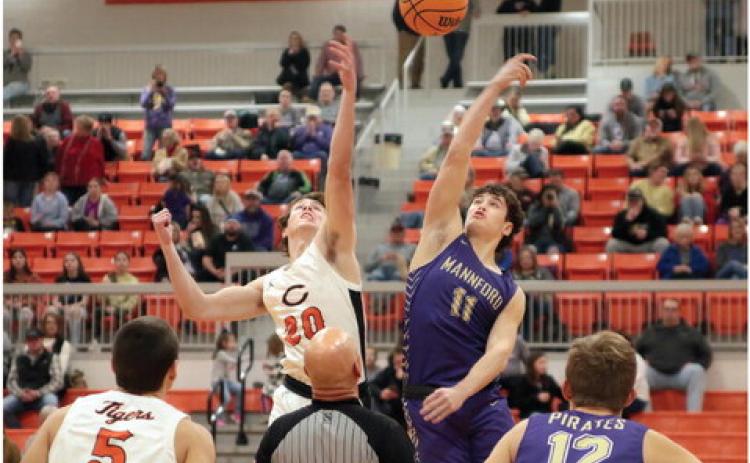 Tiger Lane Yaunt goes for the tip, to start off what proved to be an evenly matched, hard fought contest against Mannford Friday. Photo by Kaleb Tadpole