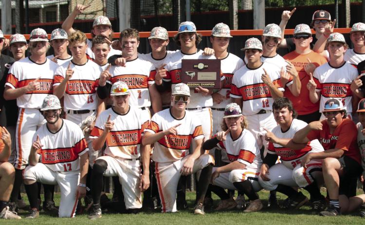 Cushing Tigers Baseball team stands with the plaque commemorating their 2023 win of the OSSAA Regional Tournament. Tigers head to the State Championship Thursday, May 11 6:30 p.m. at Edmond Memorial High School. Photo by J.D. Meisner