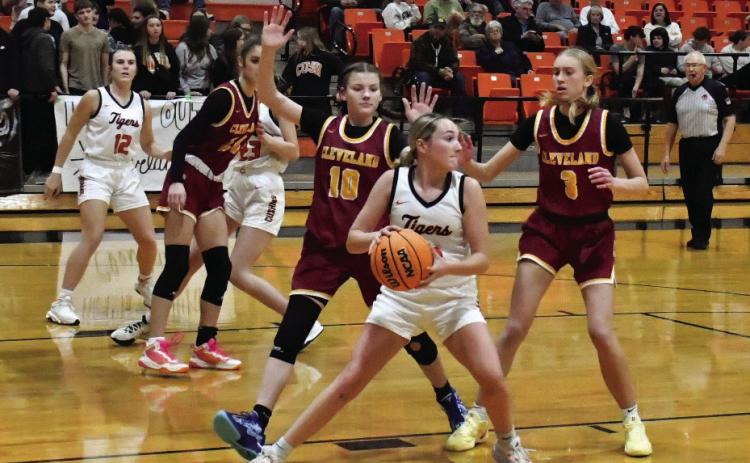 Emory Turner looks for an open teammate after pulling down a rebound. Photo by Sarah Townes