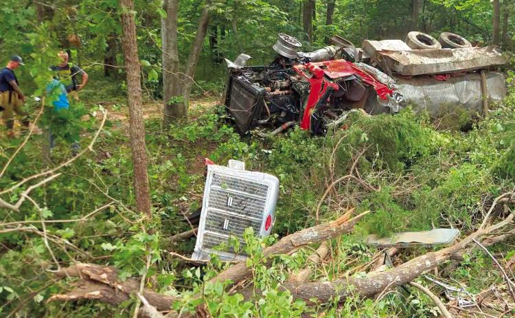 Ingalls VFD Tanker 1 lays in the trees following a crash Thursday afternoon.