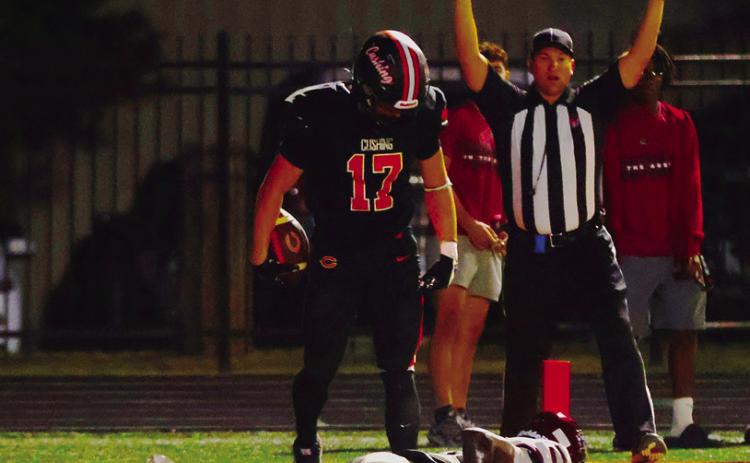 Cushing receiver Bryce Ward casts a little shade after a touchdown catch. Photo by Sylvia Danyele