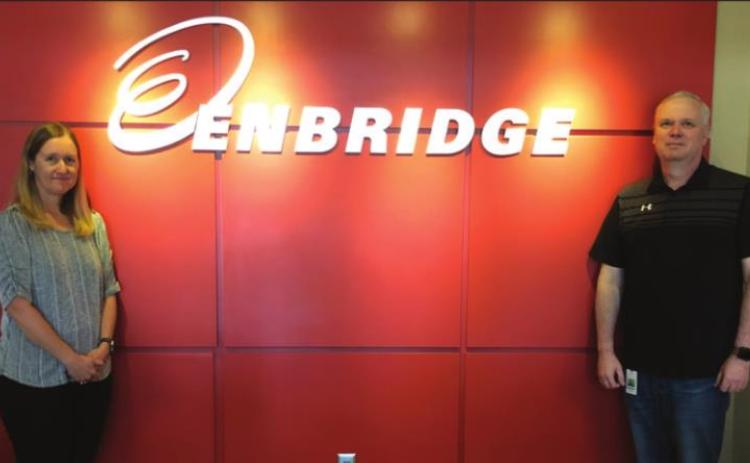 Enbridge Energy awards United Way grants in recognition of Latina Simmons (Left) and Brent Rush (right)