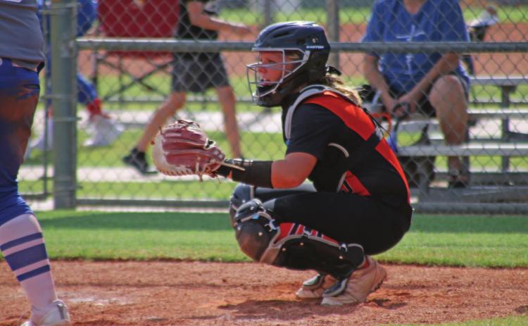 Veteran catcher Madison Alexander in her natural habitat, protecting the plate.