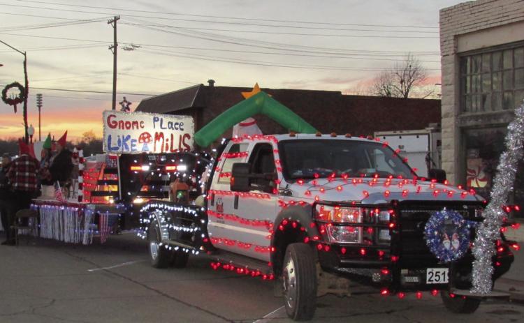 Mills Construction employees dressed as gnomes and walked alongside the trailer and truck pulling The Grinch meisering presents during the Cushing Chamber’s “Gnome Place like Cushing for Christmas” themed parade on Dec. 10. The group went home with second in the walking category.